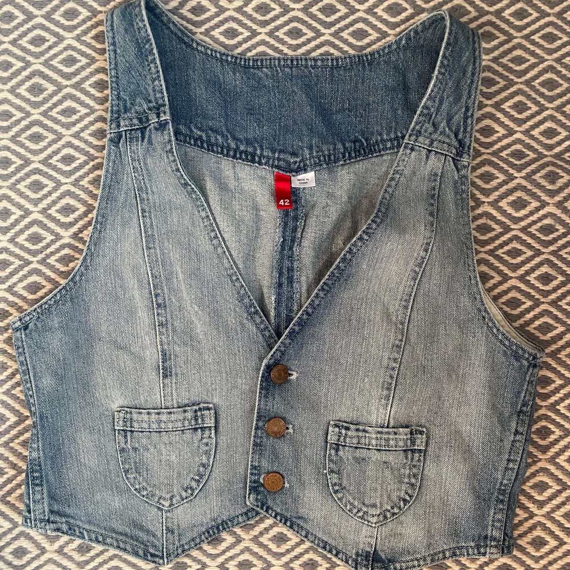 Jeansväst med knappar