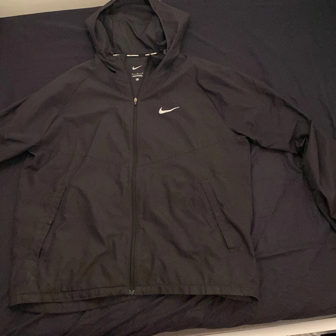 Svart vindjacka från Nike
