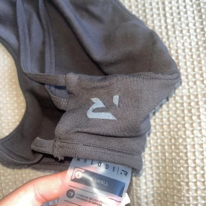 RELODE SPORT BH - Mycket bra skick, färgen brun 