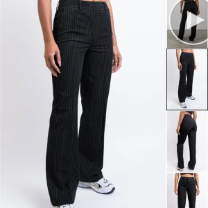 Kostymbyxor Printstripe - Svarta kostymbyxor med printstripe från Madlady storlek 38/Regular