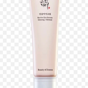 Revive Eye Serum Ginseng + Retinal - Revive Eye Serum från Beauty of Joseon med ginseng och retinal. Denna ögonserum är designad för att återuppliva och ge näring till huden runt ögonen. Kommer i en elegant tub.