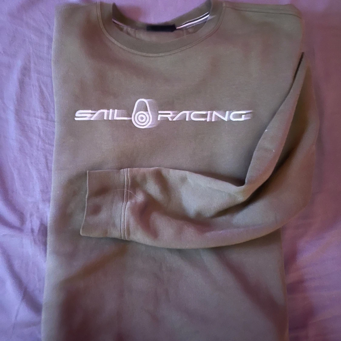 Olivgrön tröja från Sail Racing