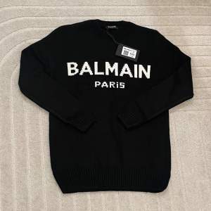 Aldrig använd stickad balmain tröja perfekt till de kalla tiderna. 