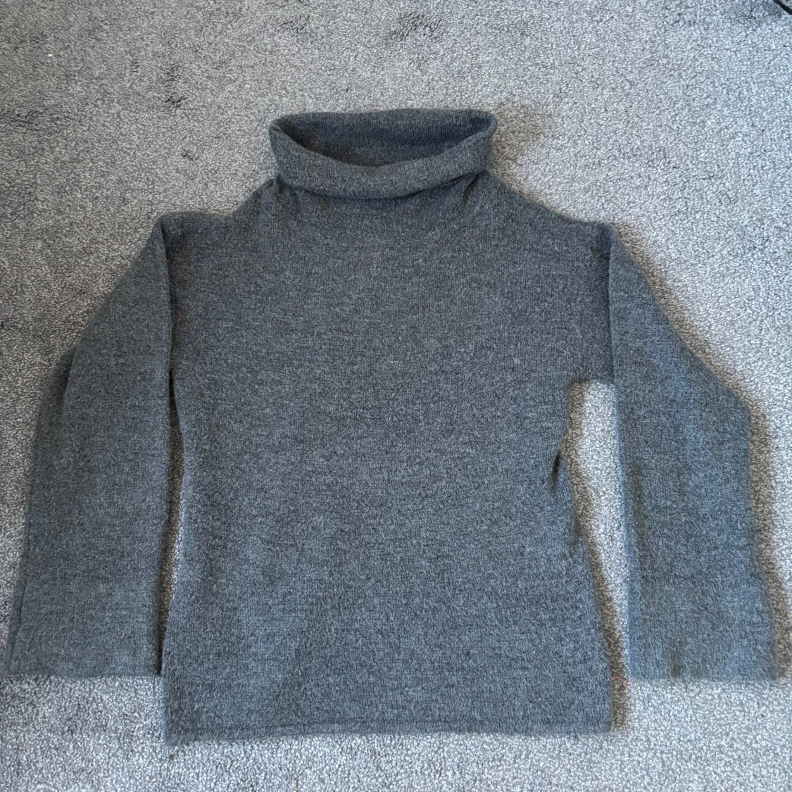 Grå polotröja från Bodyflirt. 