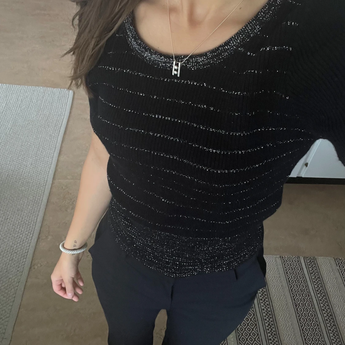 Glittrig stickad topp