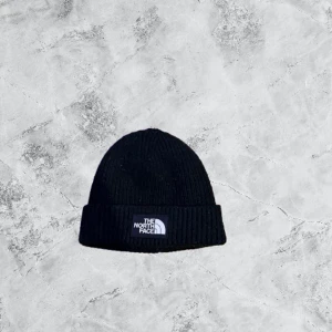 The North Face mössa - Säljer min nya The north mössa för den var lite för liten den är nästan aldrig använd!
