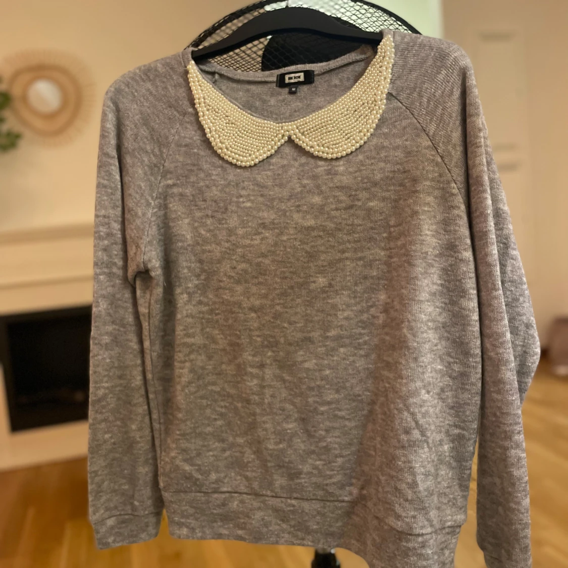 Grå tröja