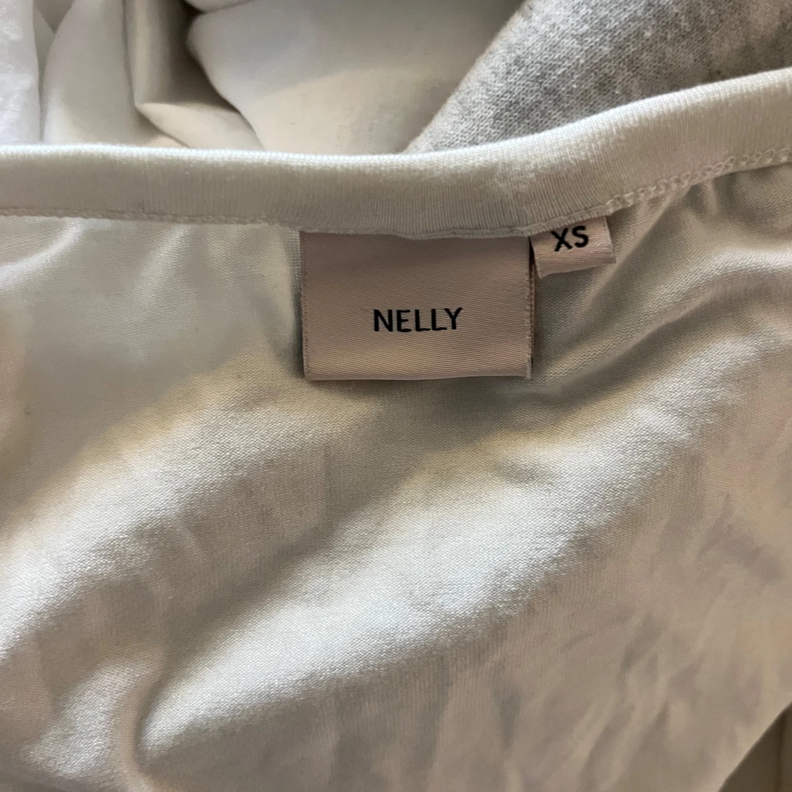 Vit långärmad topp från Nelly - 90