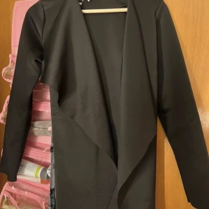 Kappa - Lång kappa som är i bra skick.