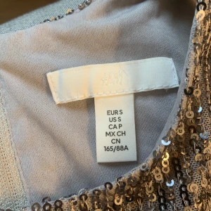 Glitter tröja - Glitter tröja storlek 165/88A Från H&M