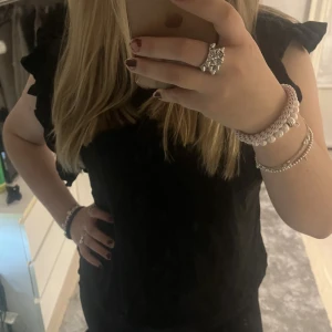 Volang topp - Bra skick! Är som ny. Använt två gånger!