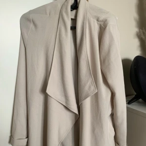 Trenchcoat - Beige trenchcoat