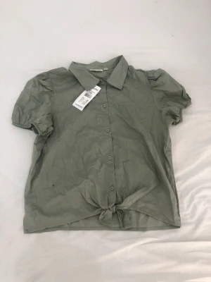 Grön skjorta  - Säljer den här gröna tröjan skjortan