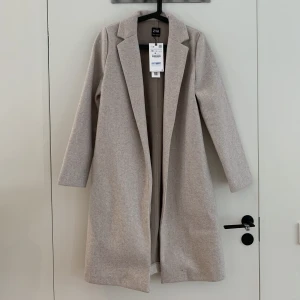 Kappa från Zara - Helt ny kapp från Zara med prislappen kvar.