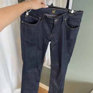 Lågmidjade Jeans - Lågmidjade Lee jeans 