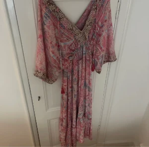 Klänning - Rosa klänning. Storlek s. Använd fåtal gånger. 