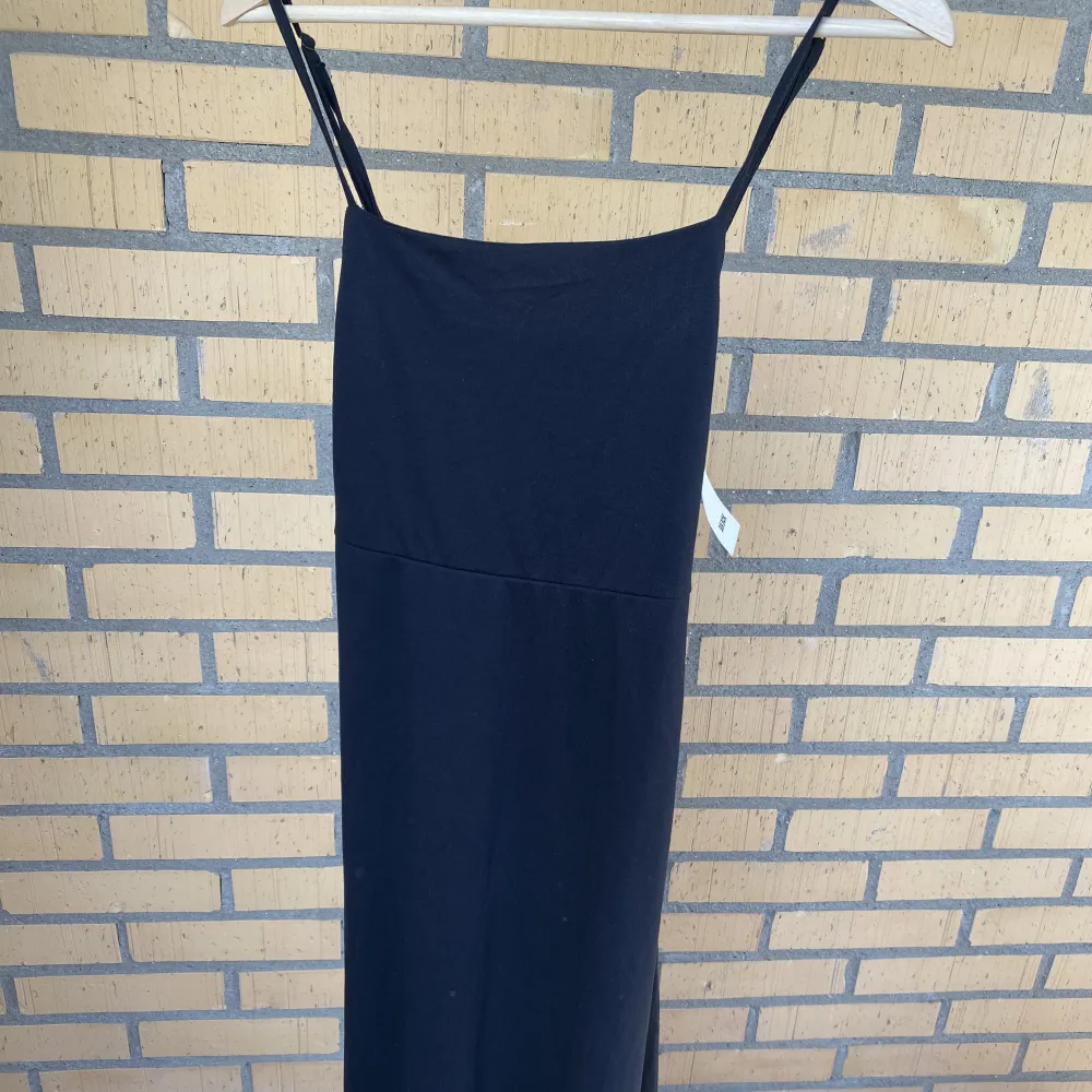 Svart bodycon klänning från bikbok, i nytt skick med prislapp på.. Mekot.