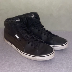 Black high-top insulated pumas - Bought these a short while ago but havent worn them much because they are too big for me.