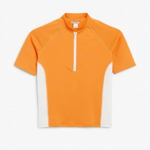 MONKI TOPP - En orange och vit topp från Monki. Bra skick. Storlek XS. 