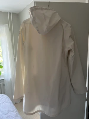 Regnkappa - Regnkappa, fåtal mindre fläckar på ryggen