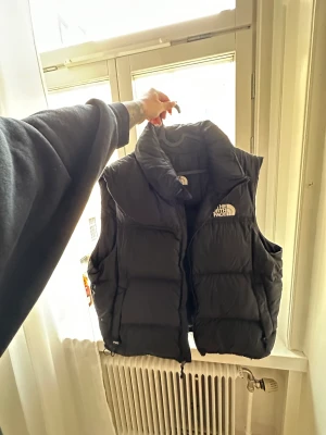 Dunväst  - Dunväst från Nortface använd 2 gånger! Storlek XL 