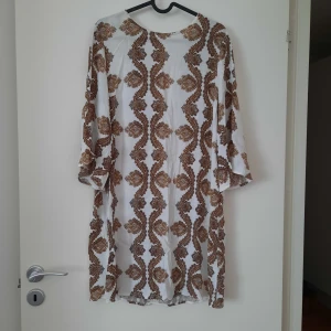 Klänning  - Storlek 38