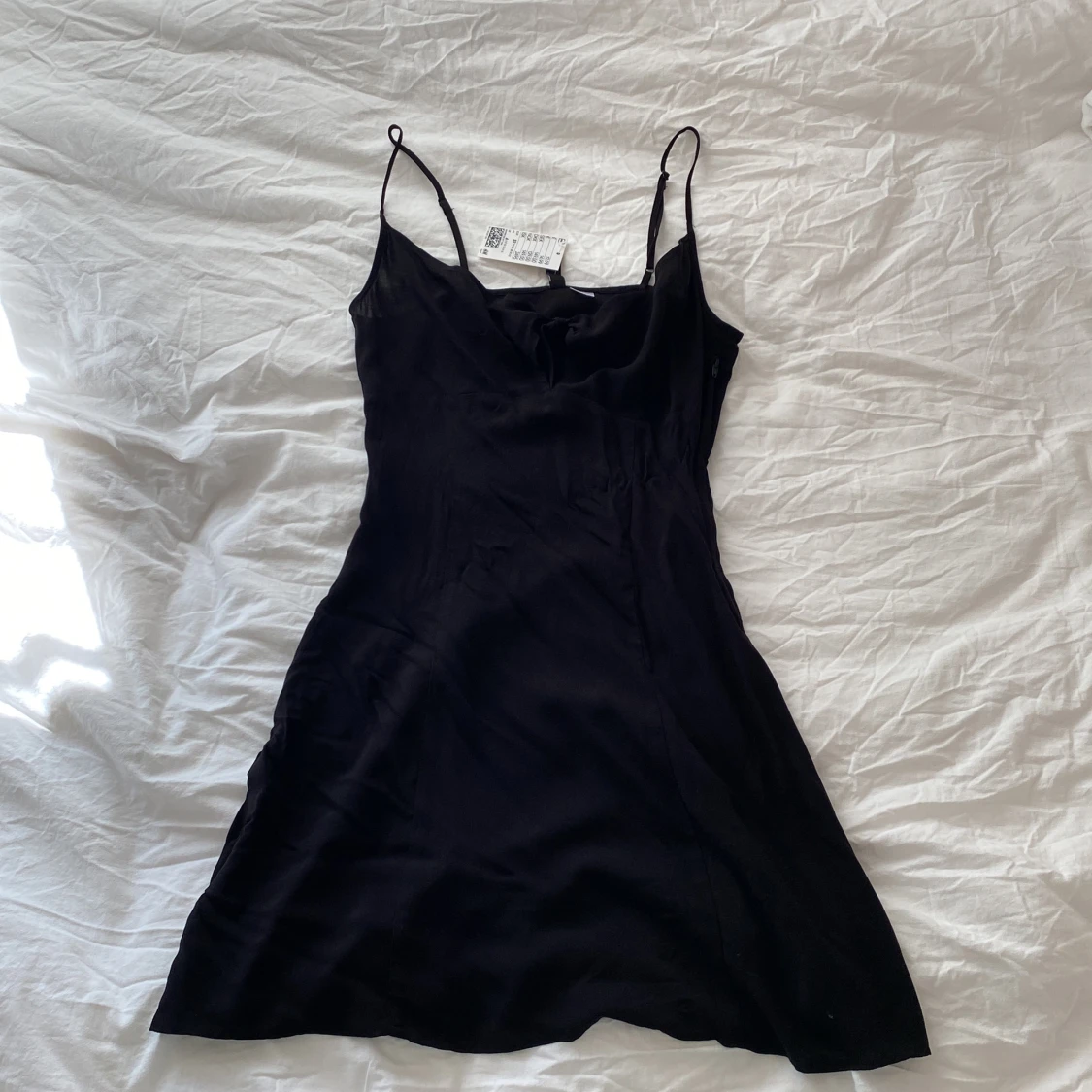 Svart figursydd klänning