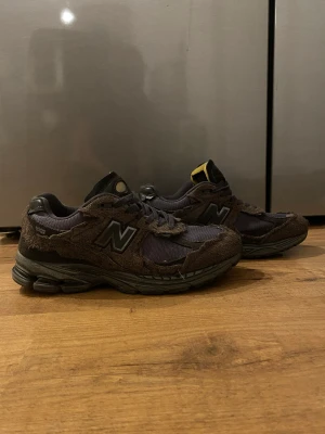 New Balance 2002R Protection pack phantom - Säljer nu mina new balance då dom för små. Köptes för cirka 4000