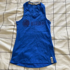 Träningslinne  - Jag säljer ett blått träningslinne i storlek S.