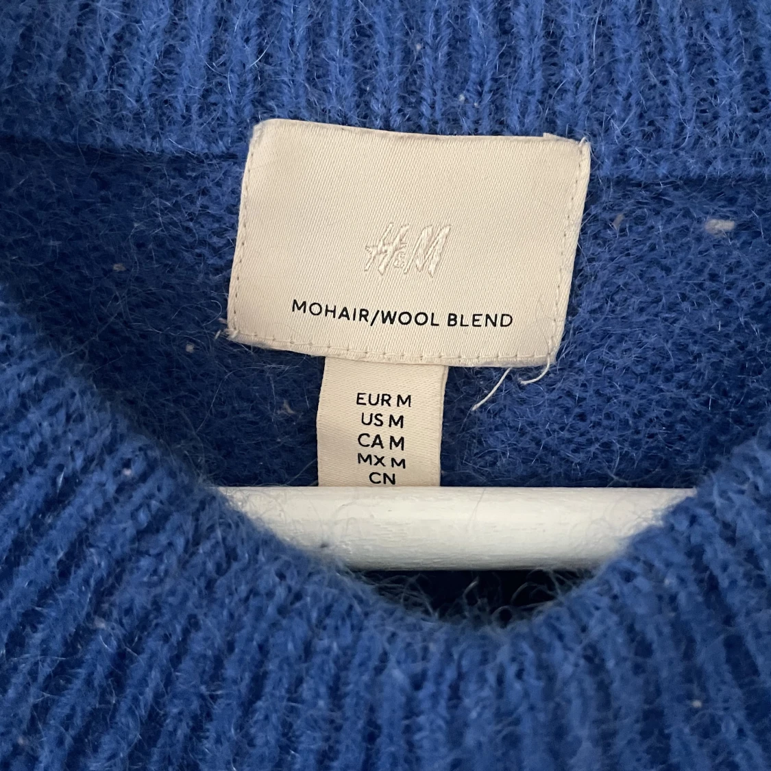 Blå stickad tröja - 90