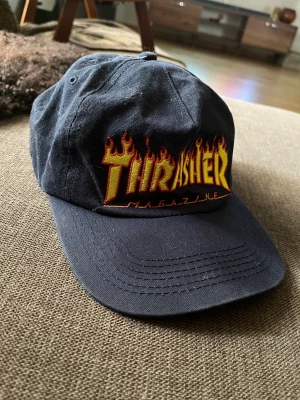 Trasherkeps - Säljer eftersom jag aldrig använder den