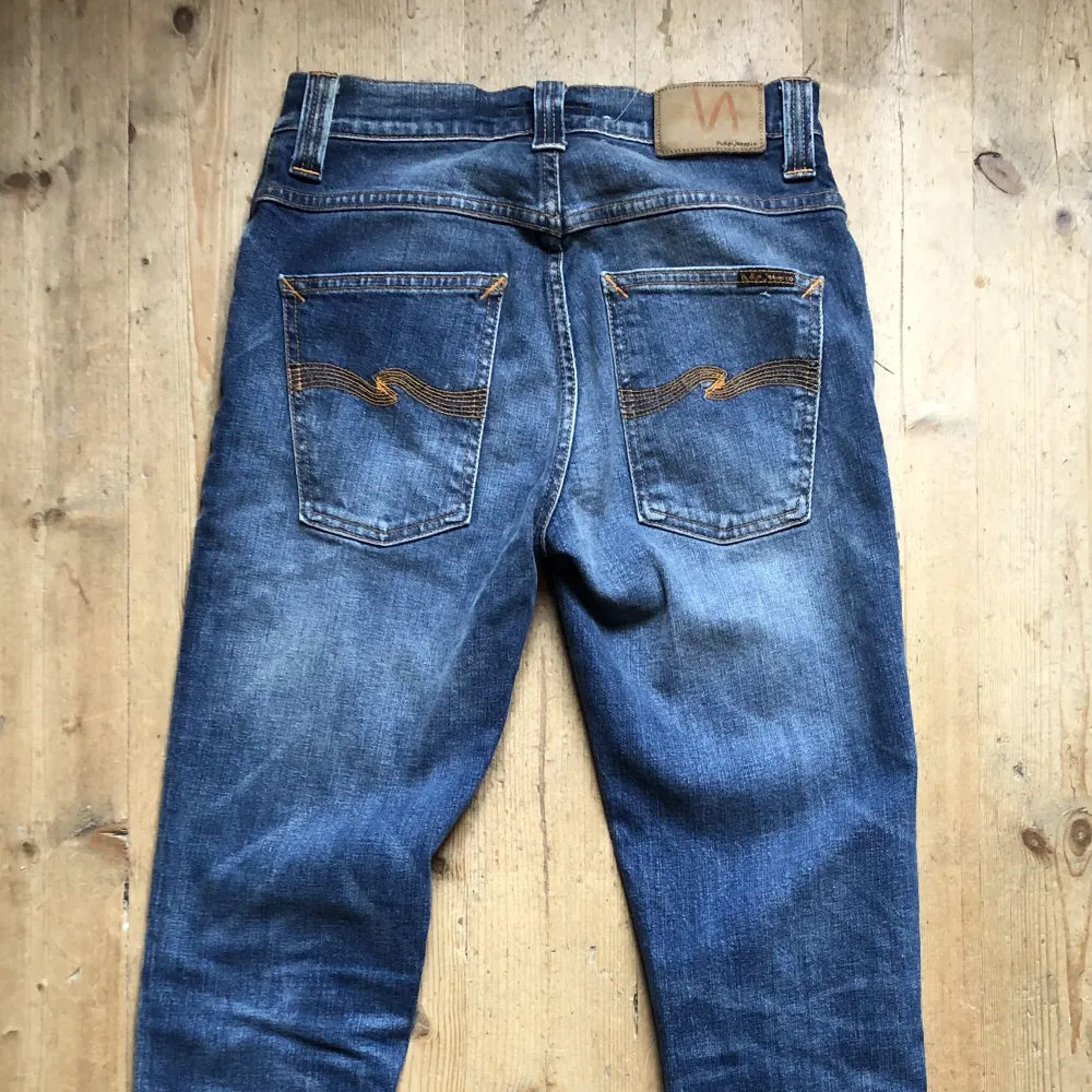 Snygga nudie jeans modell grim tim, storlek 28/32. Jeans & Byxor.