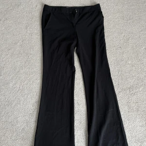 Kostymbyxor  - Svarta kostymbyxor i storlek 40/6