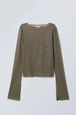 Tiah Rhinestone long sleeve - Använd 2 ggr! Från weekday och i gott skick. Strlk ca/34. Nypris 349. Mitt pris 200 + frakt.