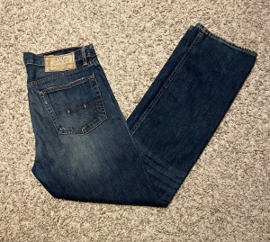 Ralph Lauren jeans  - Ett par riktigt sköna Ralph Lauren jeans i färgen blå, skick 8/10