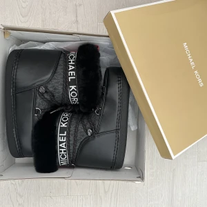 Snow boots  - Zelda boots from Michael kors. Worn once in excellent condition. Size 38