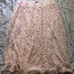 Stor rosa långkjol med coolt mönster - Kjol från lindex storlek L