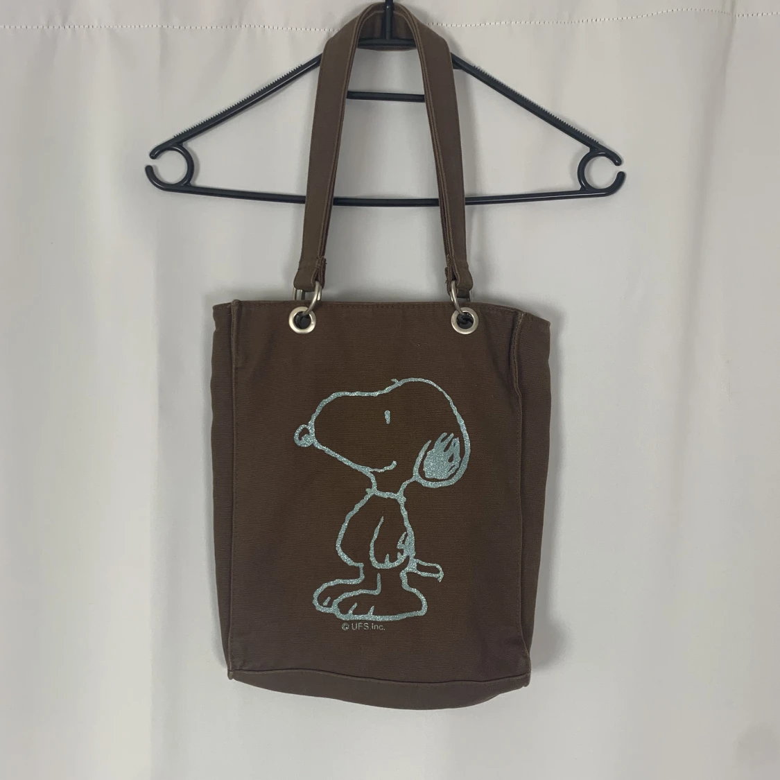 Axelväska med snobben-motiv