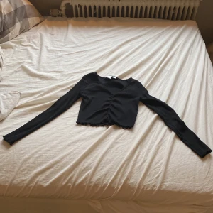 Svart magtröja  - Storlek:134/140