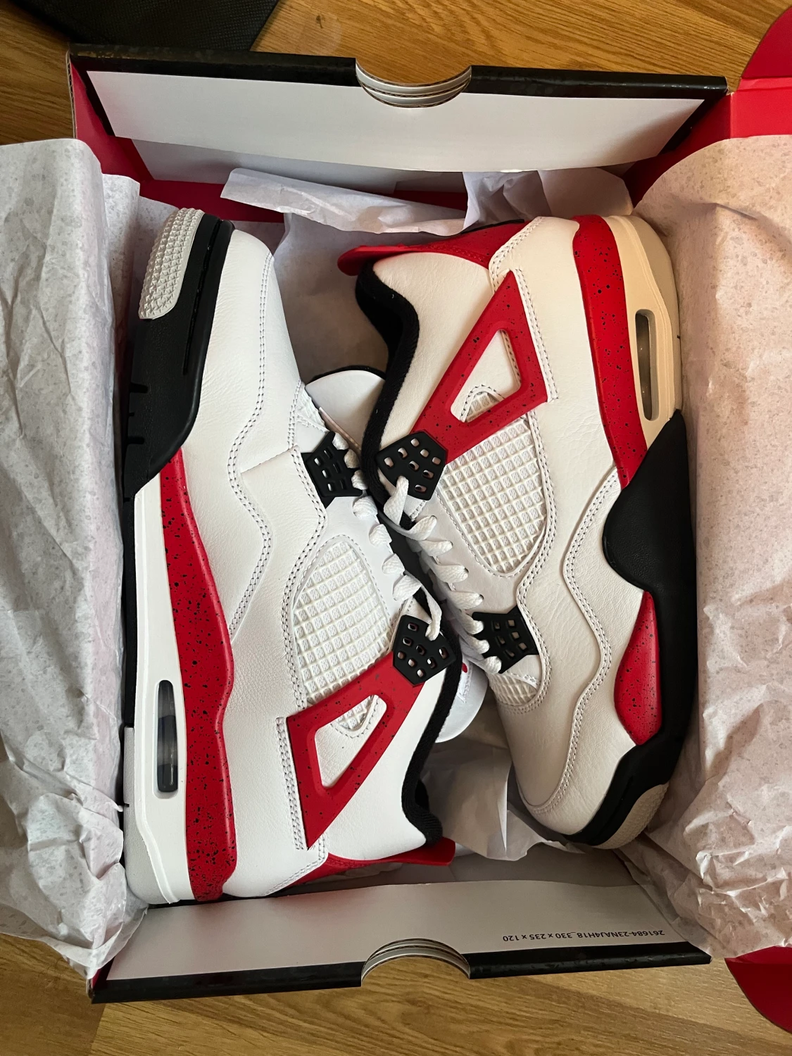Jordan 4 Retro Red Cement