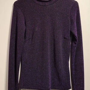 NLY.trend Lila Glitter  - Oanvänd