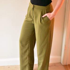 Amazing green flared trousers from monki. Great condition, size 36. My length is 168 cm