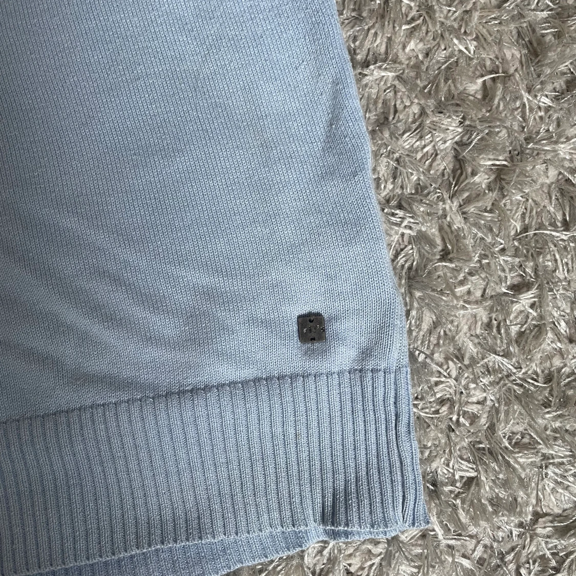 Blå stickad väst - 91