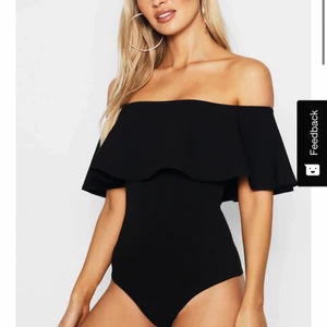 Body med volang - Jättefin body med volang! Aldrig använd! 