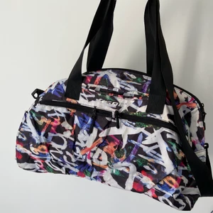 Gym bag  - Colorful big gym bag from team sportia. Has many pockets and two different handles (however one is a bit cut but can still be used). 