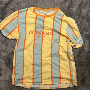 Guess x Asap Rocky T-shirt - Storlek M lite oversized, bra skick och inget slitage.