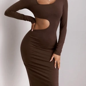 Brun kläning  - Fin brun kläning, i mycket bra skick, använt en gång.