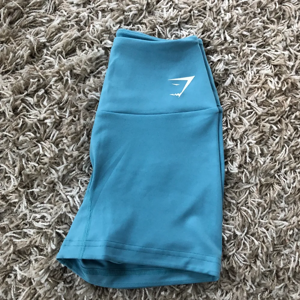 Gymshark shorts that I never worn because they did not fit me and I couldn’t send them back because I moved back to Sweden and I had bought them while in Italy where I am from. Brand new. Bought for 299kr and selling for 90Kr+ shipping. Size XS. . Shorts.