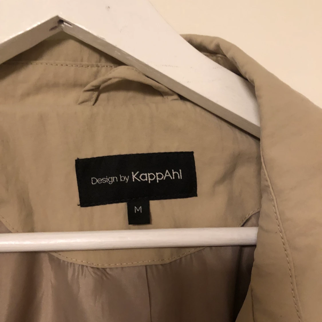 Beige kappa från Kappahl  - 91