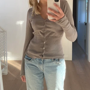 Kofta - Kofta med en figursydd stil!